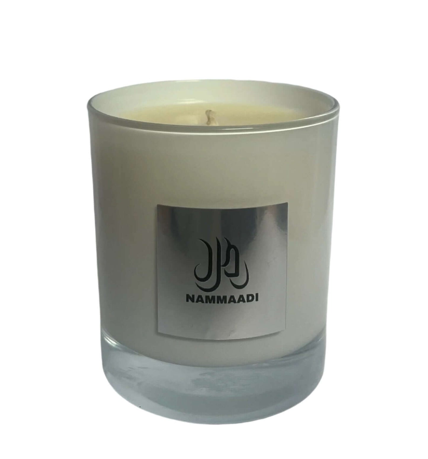 Meadow Lily candle with lily, rose, white flowers, vetiver, tonka bean, musk, and sandalwood in a 220g glass jar for a soft, luxurious scent.