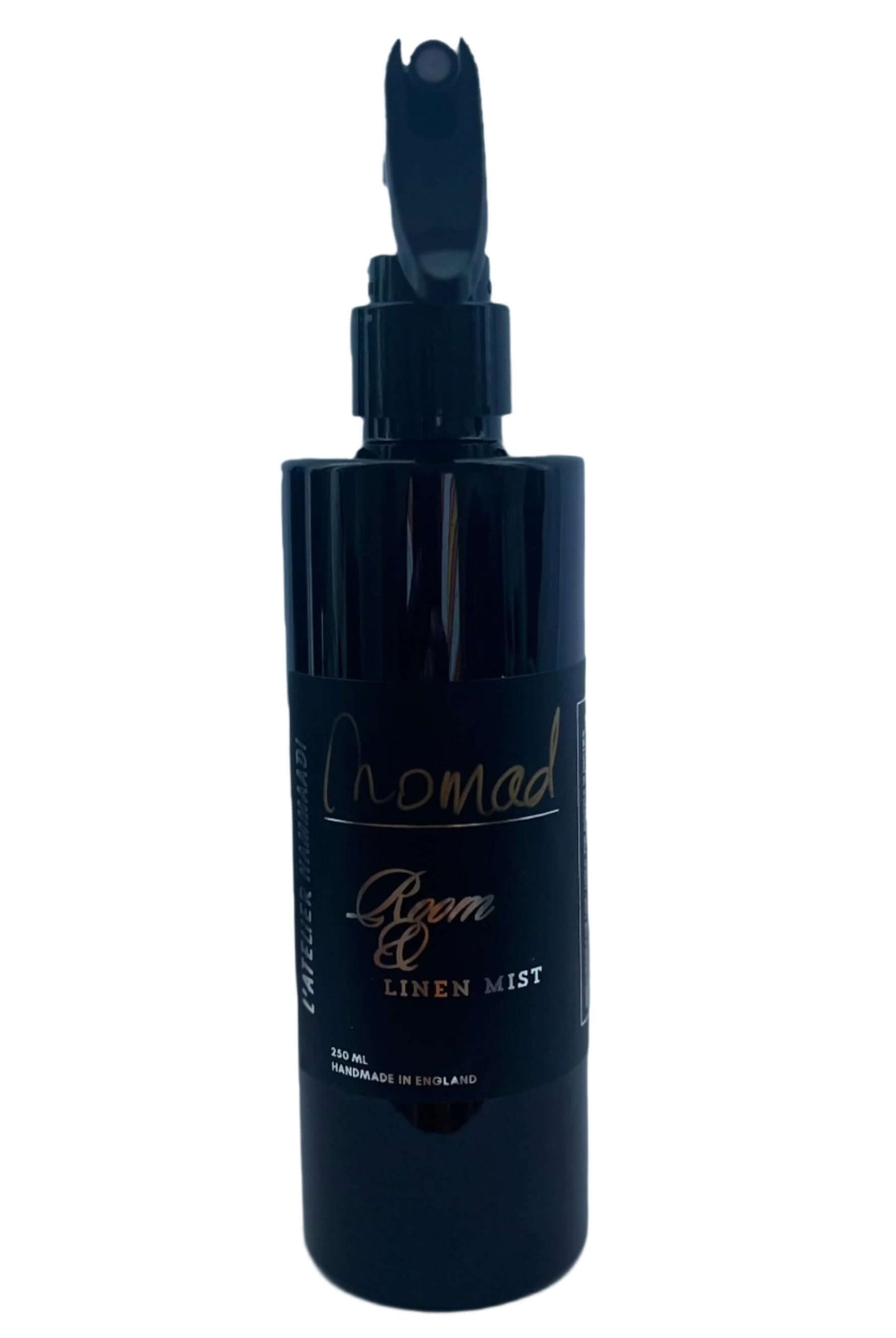 Nomad Oud Room & Linen Mist with rose, amber, guaiacwood, jasmine, patchouli, lily, and a base of sandalwood, cedarwood, vanilla, and musk.